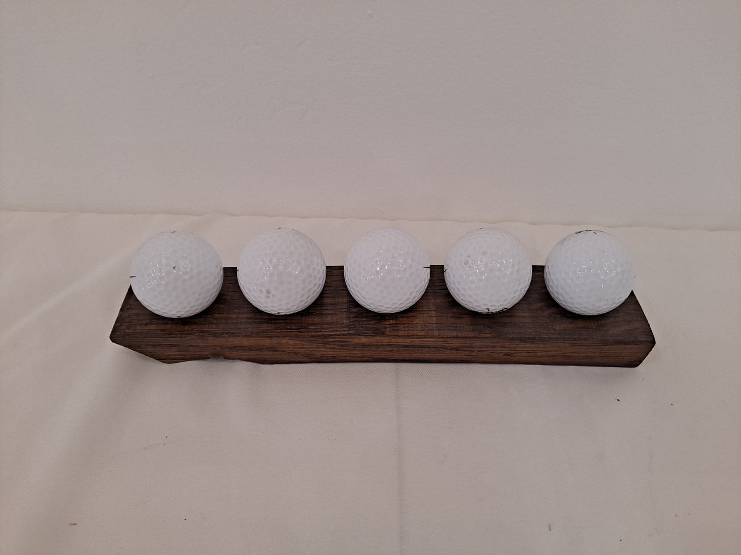 Golf ball holder from stave